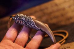 摸金校尉的摸金符为什么像牙齿，是什么动物的牙吗？